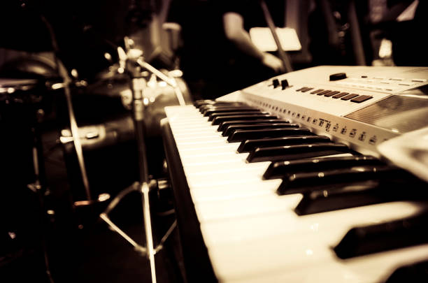 istock black and white abstract image of music instrument, electronic piano under low light 1029650920