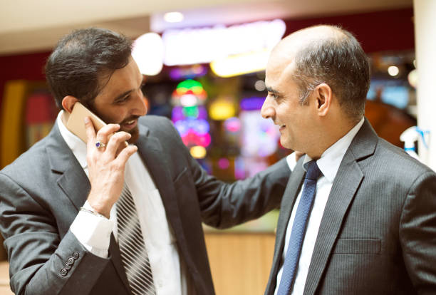 istock Businessmen talking on mobile phone 1029657132