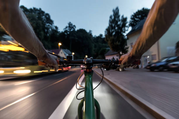 istock A cyclist and a bus on a street 1029668588
