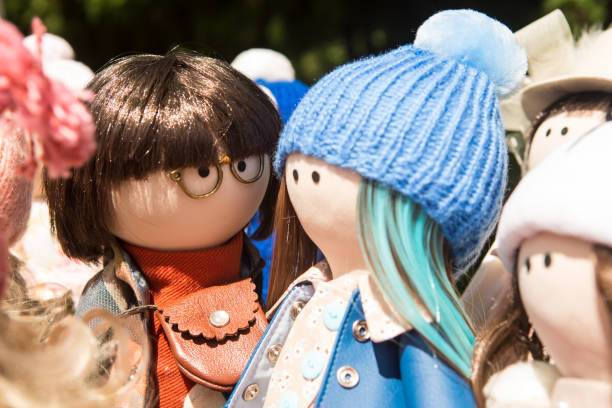 istock cute handmade dolls are sold at the fair 1029668882