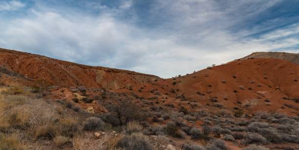 istock Red Sandstone and Sagebrush with Beautiful Cloudscape 1029669216