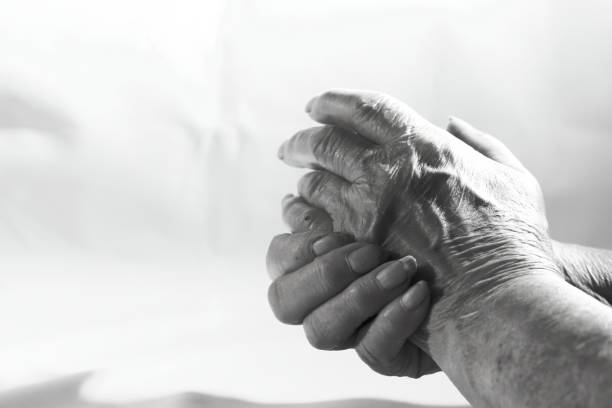istock The hand of an elderly lady indicates the right way. 1029678070
