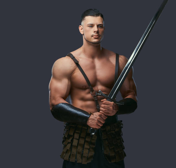 istock Brutal ancient Greece warrior with a muscular body in battle uniforms 1029686476