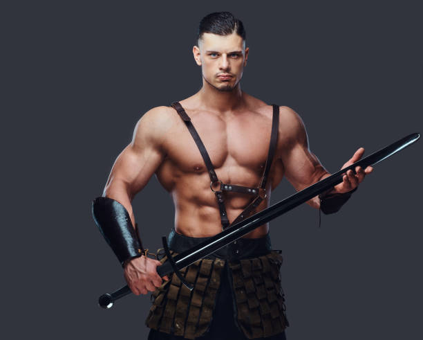 istock Brutal ancient Greece warrior with a muscular body in battle uniforms 1029686512