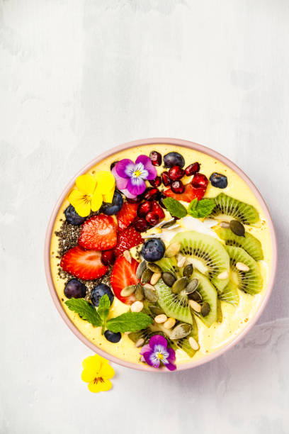 istock Mango banana pineapple turmeric smoothie bowl 1029692170