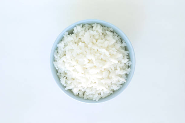 basmati branco tigela de arroz natural alimentos cozidos - clipping path rice white rice basmati rice - fotografias e filmes do acervo