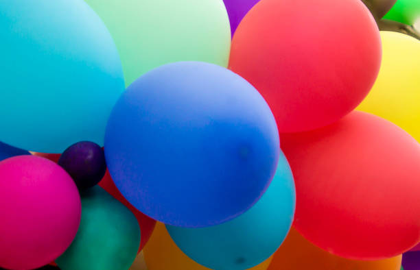 istock bright multicolored festive background with balloons 1029704072