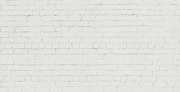 fondo de pared de ladrillo blanco panorámica - piedra material de construcción fotos fotografías e imágenes de stock