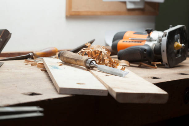 istock chisel an sawdust on wooden board.copy space 1029716906