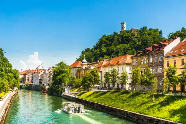 Photo of medieval buildings and ljubljanica river in Ljubljana - Slovenia