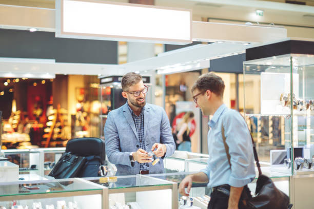 istock Young man is shopping for a watch 1029734208
