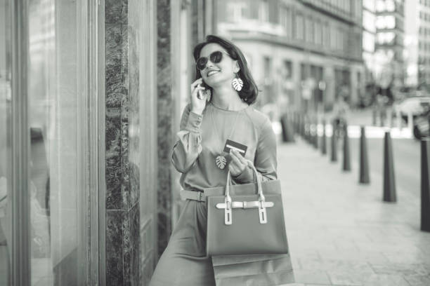 istock Young woman is ordering goods on her mobile 1029735398