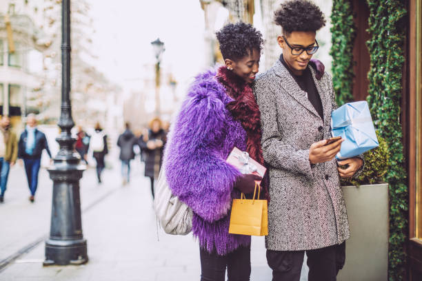 istock Young couple is buying Christmas presents 1029735612