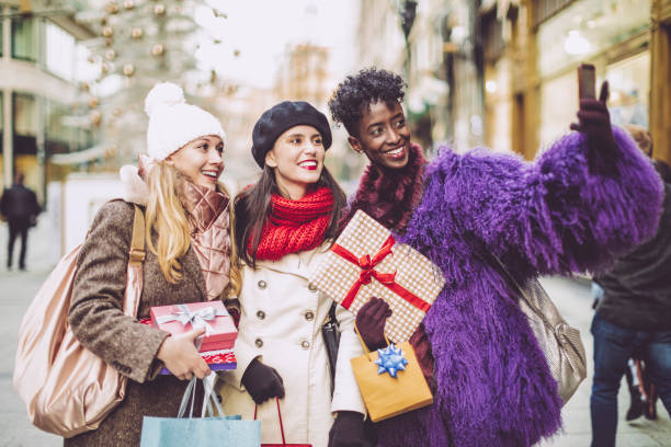 istock Friends are taking a selfies with Christmas presents 1029738042