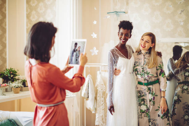 istock The bride is trying on her wedding dress 1029739084