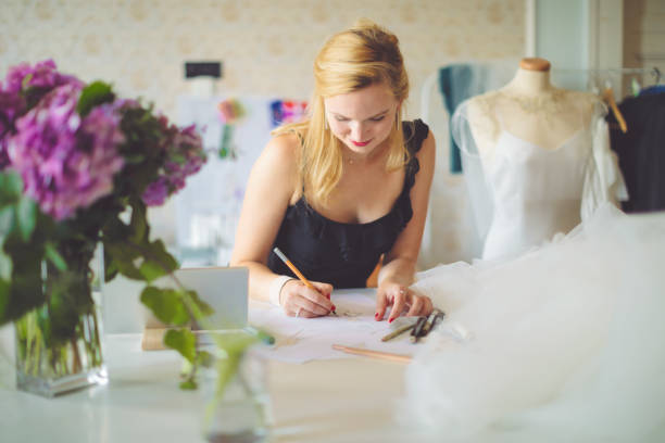 istock Fashion designer is making new sketches 1029739216