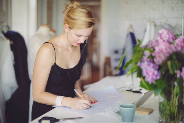 istock Fashion designer is making new sketches 1029739294
