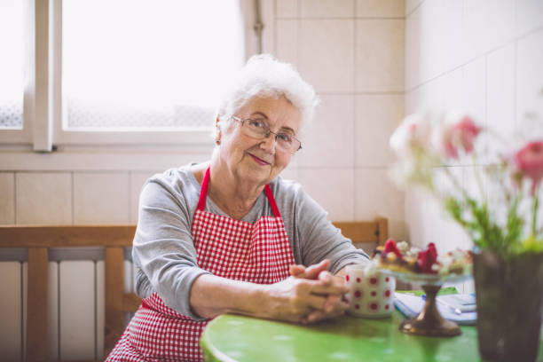 istock Beautiful senior woman is looking confidently at camera 1029744296