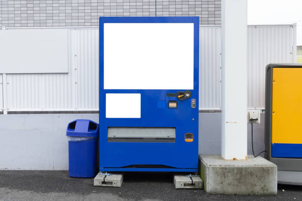 istock Empty white shelves of standard office vending machine 1029747212