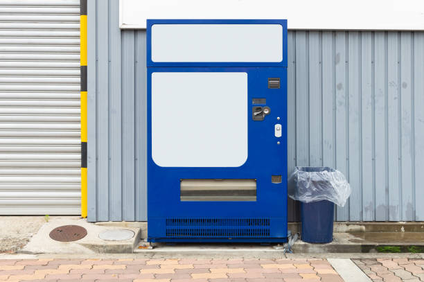 istock Empty white shelves of standard office vending machine 1029747242