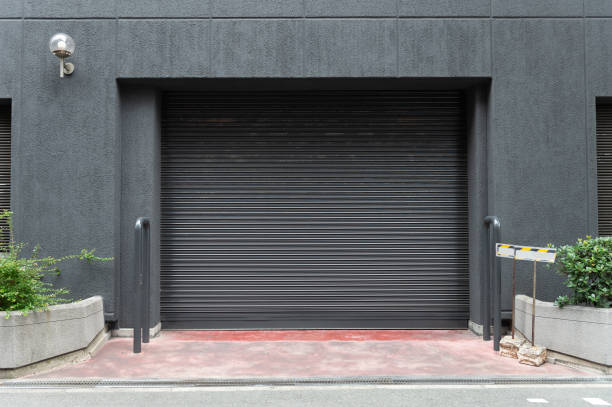 istock sidewalk by street wall & door 1029747444