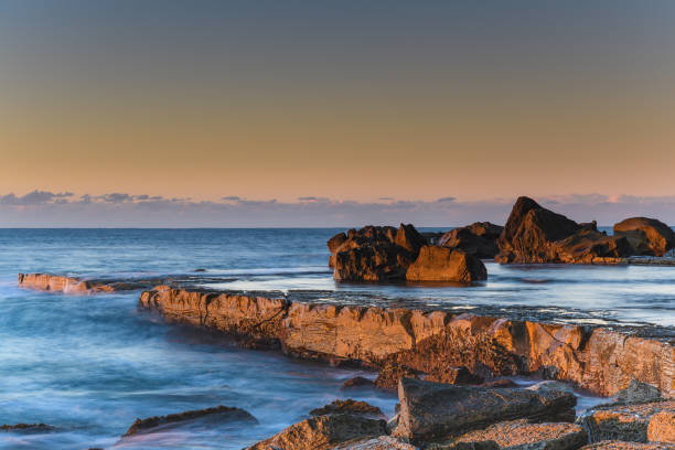 istock Sunrise, the Sea and Tessellated Rock Platform 1029758756