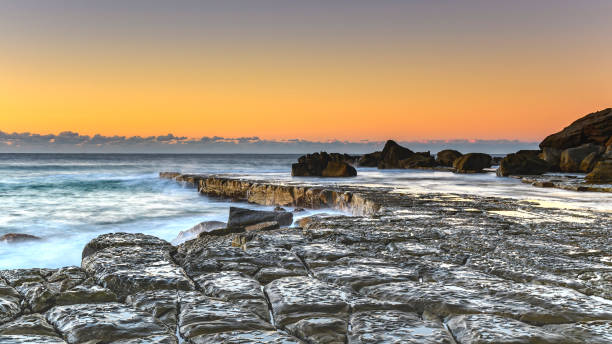istock Sunrise, the Sea and Tessellated Rock Platform 1029758766
