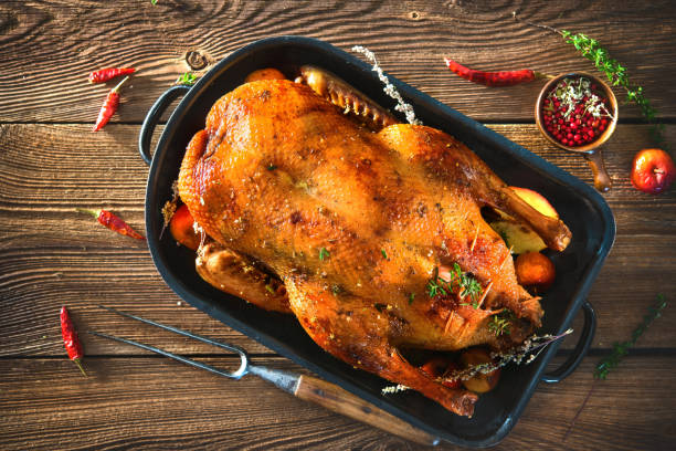 istock Roast Christmas duck with thyme and apples 1029765828