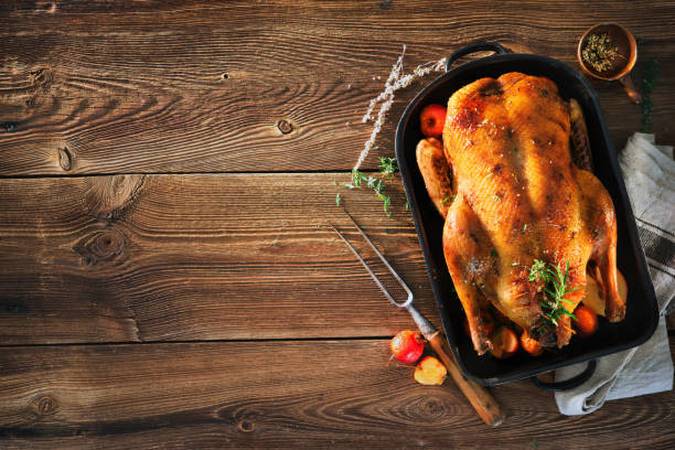 istock Roast Christmas duck with thyme and apples 1029765834