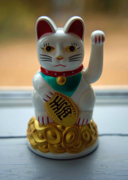 istock Maneki-Neko Beckoning Cat figurine 1029767900