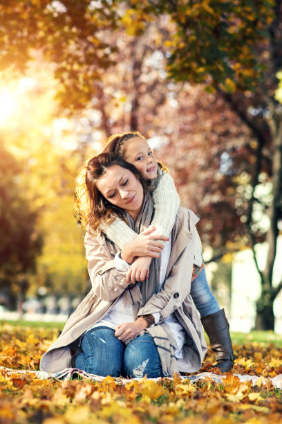istock Mother and daughter in park 1029770864