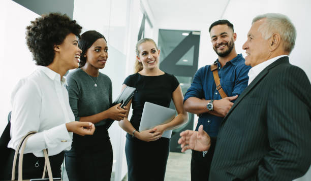 istock Multi-ethnic business group in office corridor 1029783088