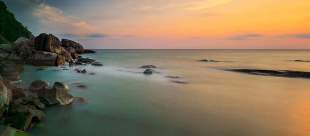 istock Tropical beach at sunrise 1029783154