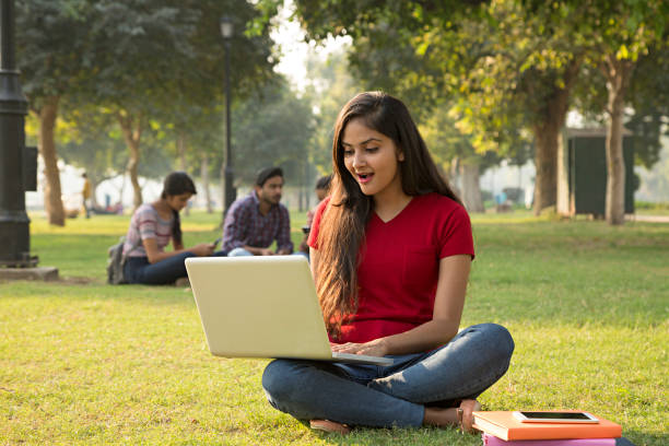 istock Young female student in the park - Stock image 1029783782