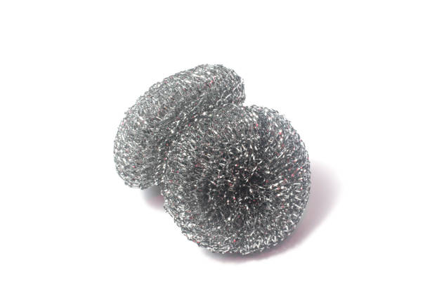 istock metallic sponge for dishes on white isolated background 1029795060