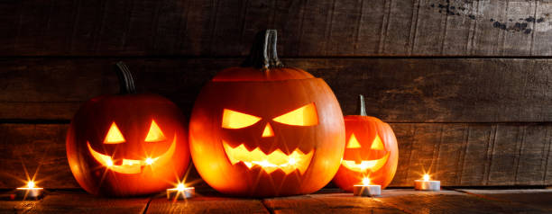 istock Halloween pumpkins and candles 1029795106