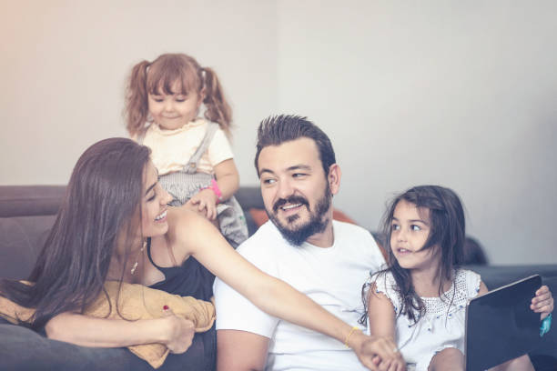 istock Happy family spending fun time at home 1029795230