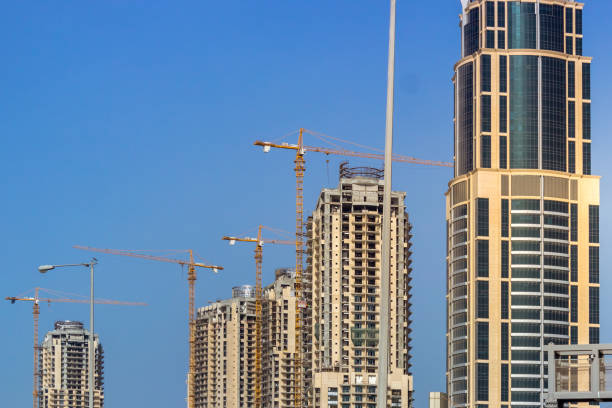 istock Middle Eastern City Skyline Construction High Rises Sunny 1029798186
