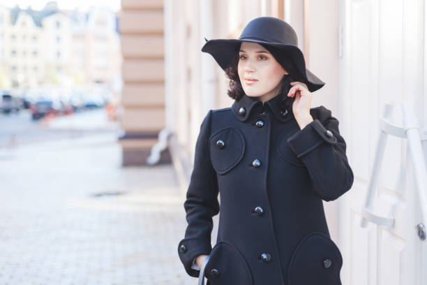 istock Full young woman in coat and hat. 1029801110