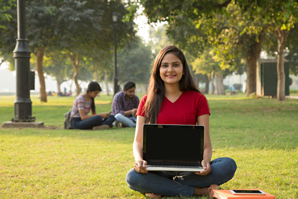 istock Young female student in the park - Stock image 1029801624