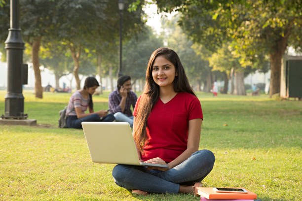 istock Young female student in the park - Stock image 1029805592