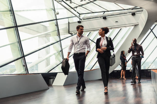 istock Business partners walk along the corridor 1029807732