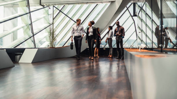 istock Business partners walk along the corridor 1029807750