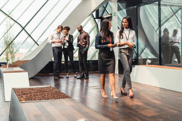 istock Business partners walk along the corridor 1029807762