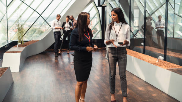 istock Business partners walk along the corridor 1029807776