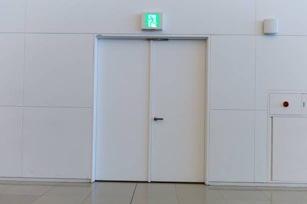istock sidewalk by street wall & door 1029810898