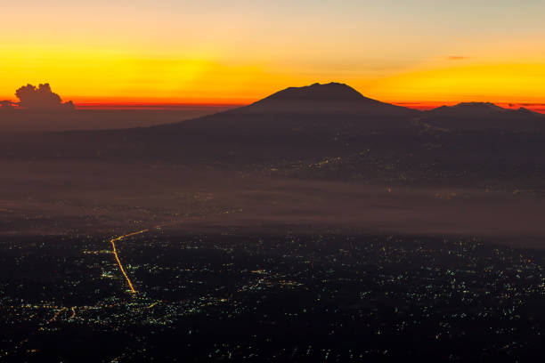istock View at Mt. Lawu and villages at down from mt. Merapi summit. 1029811386
