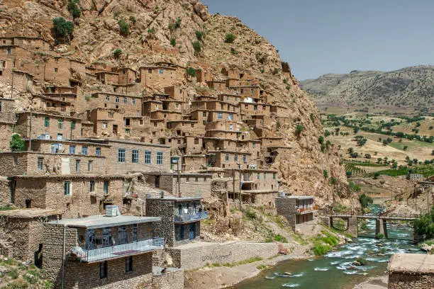 Palangan village in Kurdistan. Iran. Old brick house terraces on the slope of mountain.
