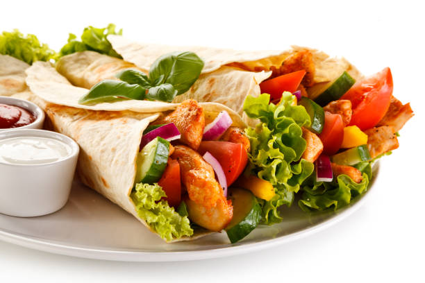 istock Kebab - grilled meat and vegetables on white background 1029817054