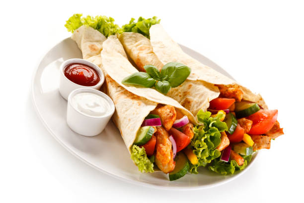 istock Kebab - grilled meat and vegetables on white background 1029817098
